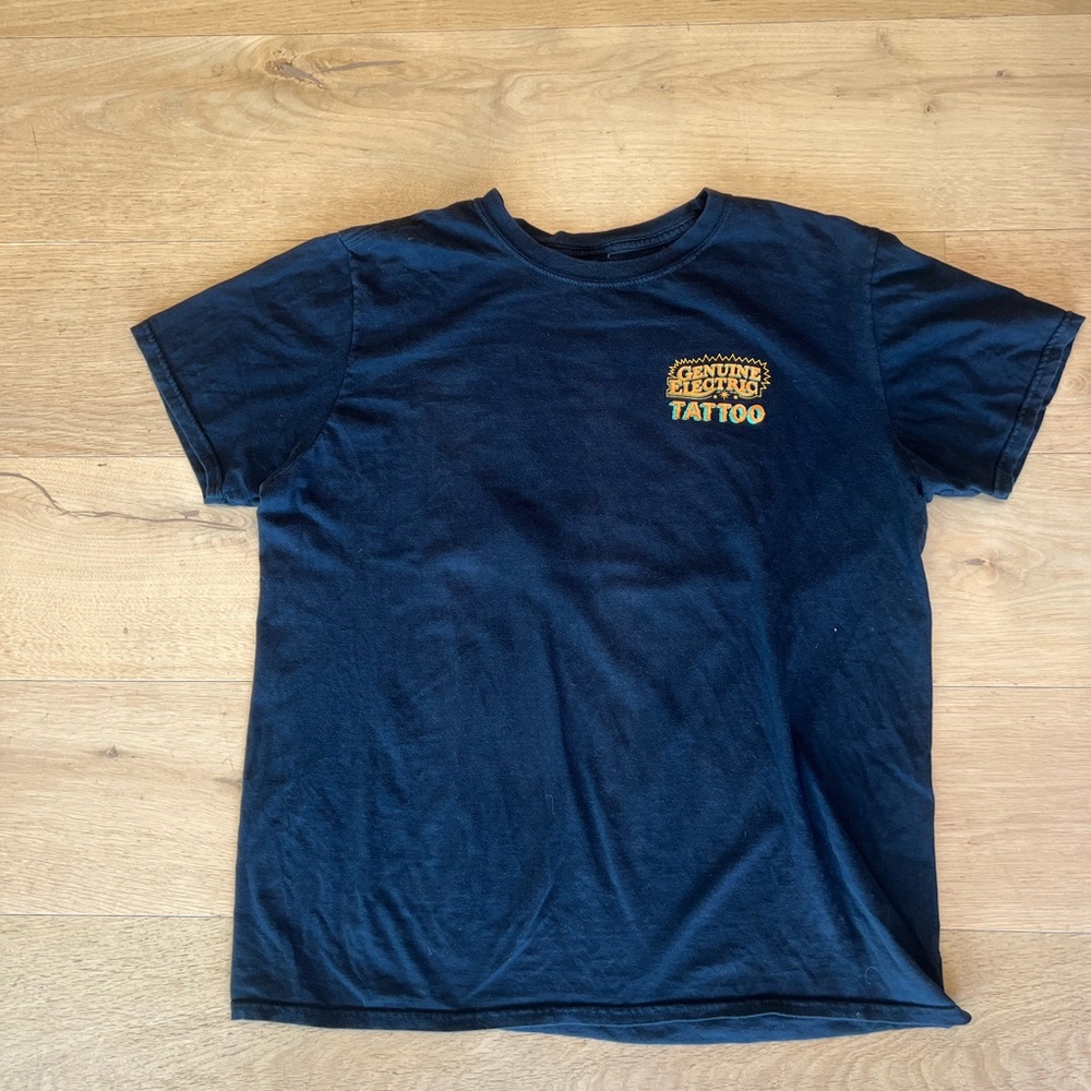 Awesome vintage tattoo shop tee. From Genuine electric tattoo in LA.